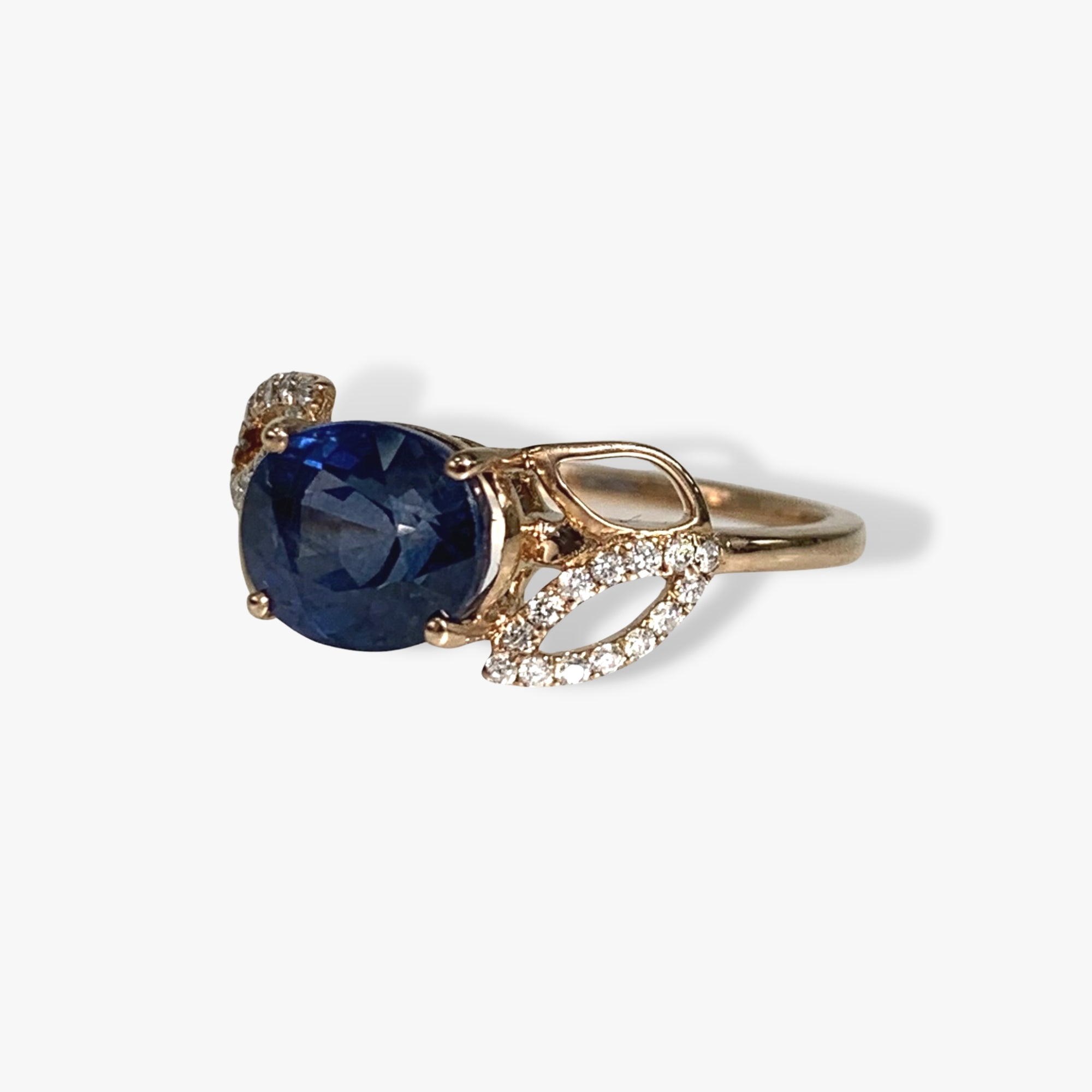 14k Rose Gold Oval Cut Blue Sapphire and Diamond Floral Ring Side View