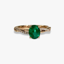 14k Rose Gold Oval Cut Emerald and Diamond Twisted Shank Ring