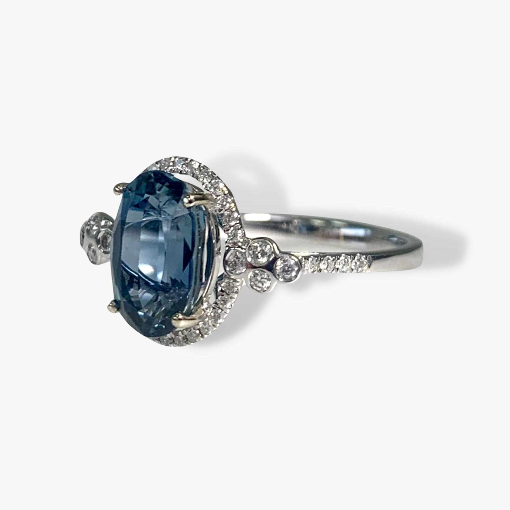 14k White Gold Oval Cut Blue Sapphire and Diamond Ring Side View
