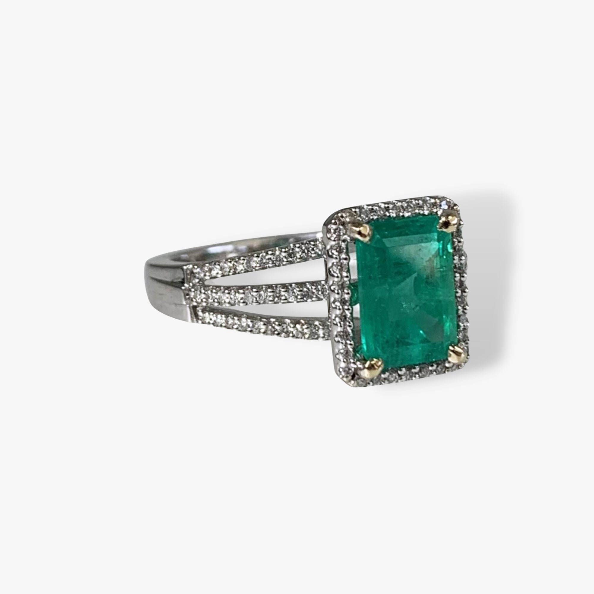 18k White Gold Emerald Cut Emerald Diamond Halo Triple Split Shank Ring Side View