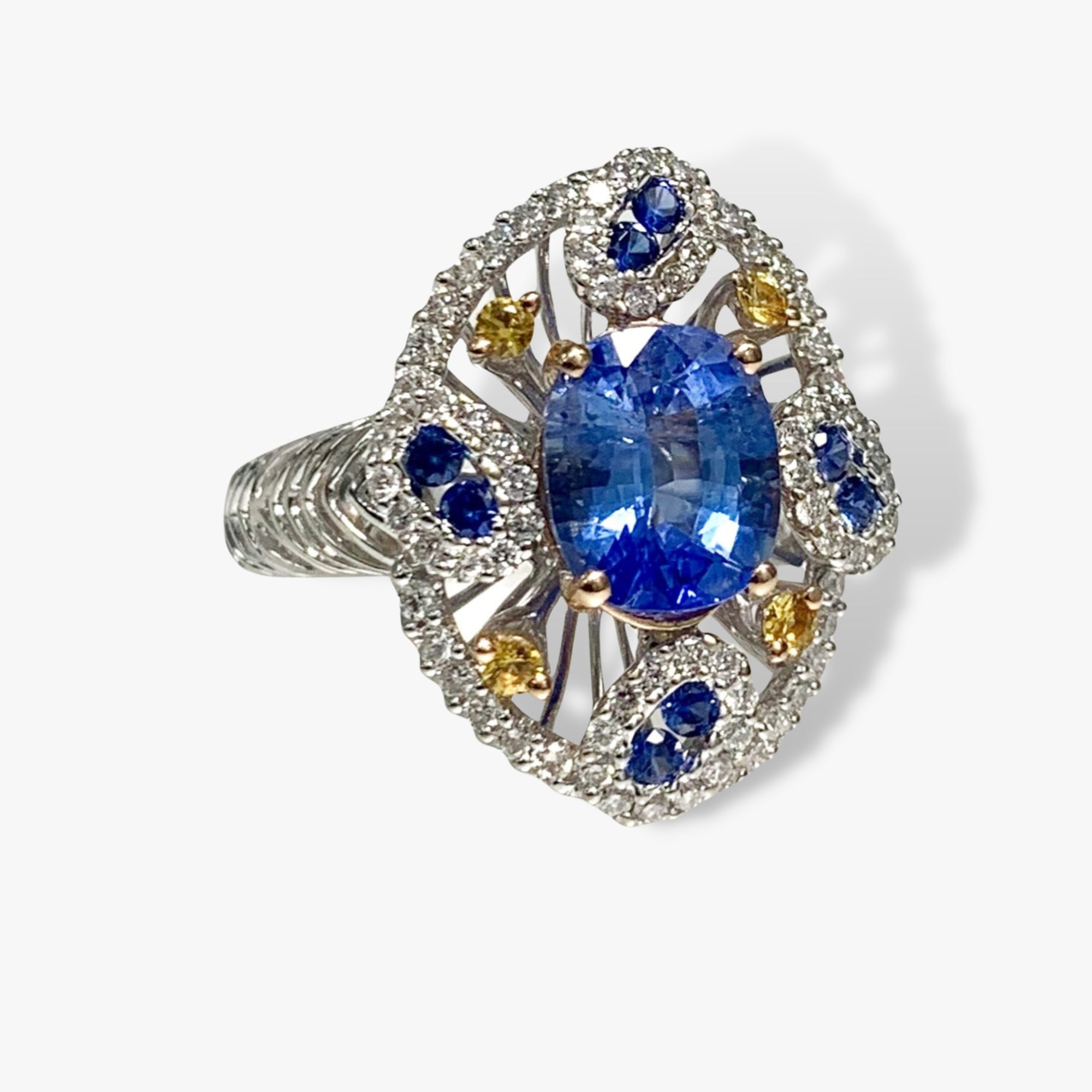 18k White Gold Oval Cut Blue and Yellow Sapphire Diamond Ring Side View