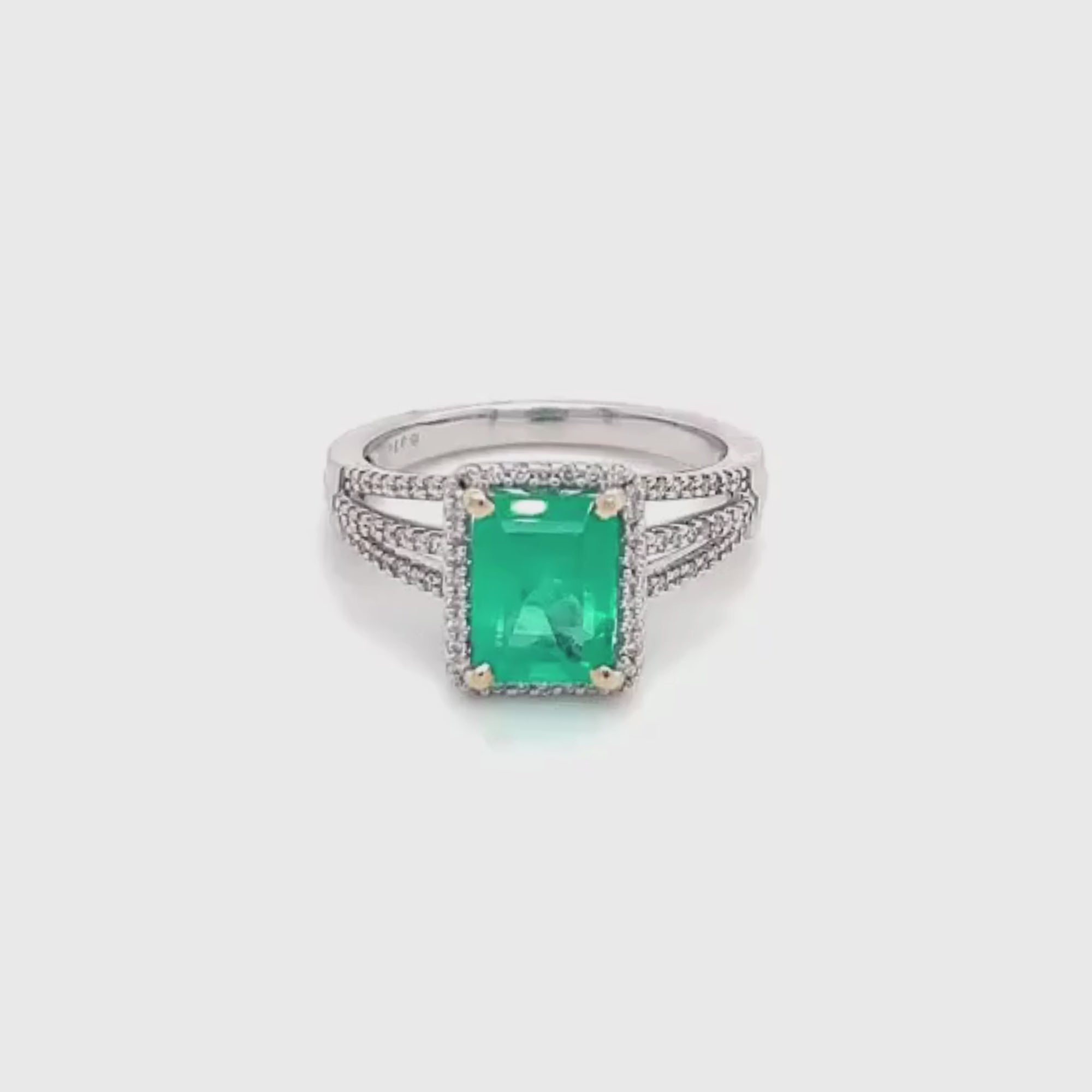 18k White Gold Emerald Cut Emerald Diamond Halo Triple Split Shank Ring