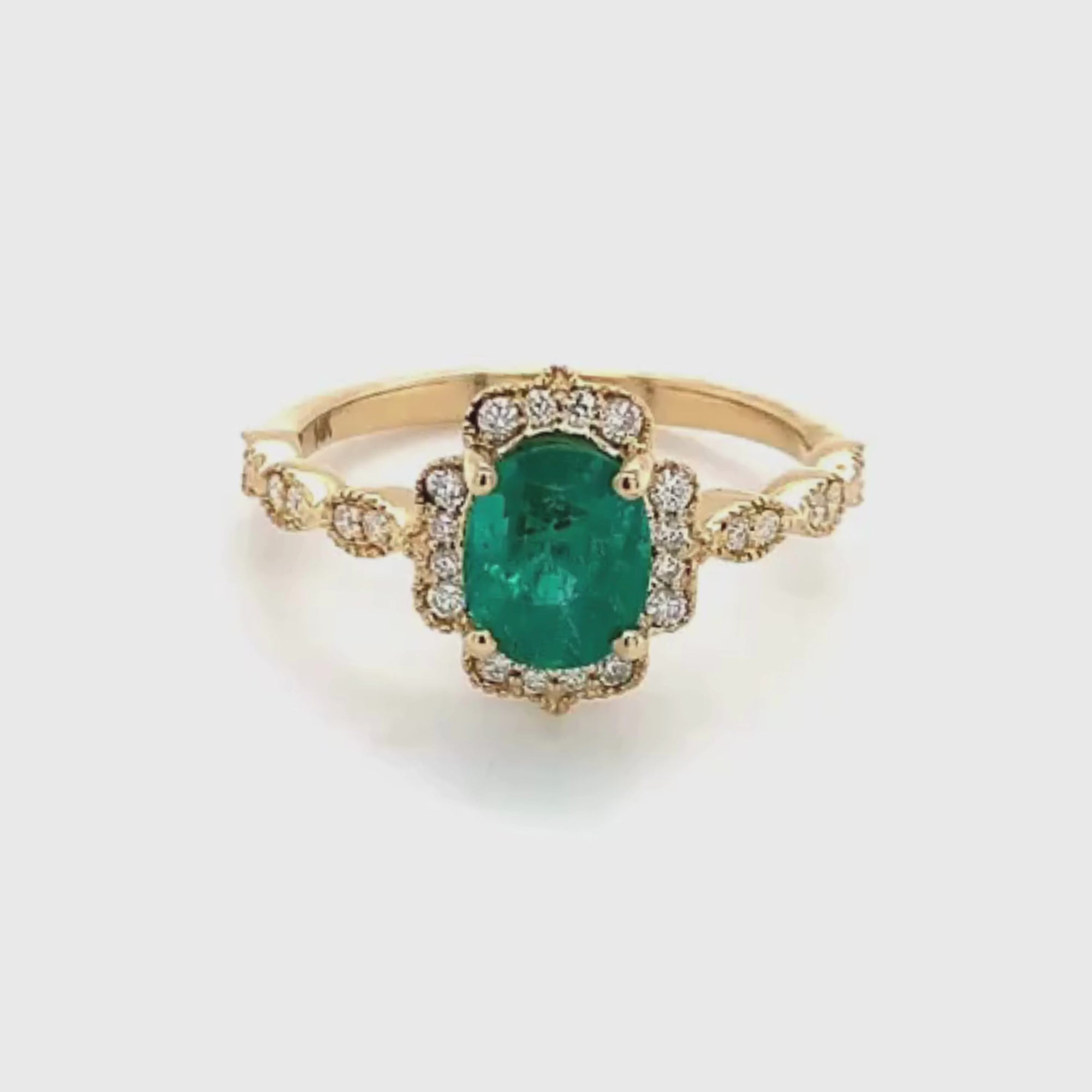 14k Yellow Gold Oval Cut Emerald and Diamond Ring