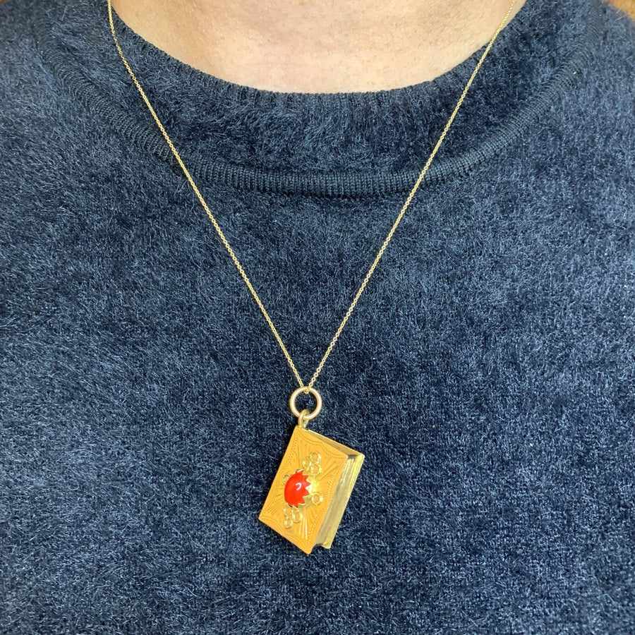 14k Yellow Gold Red Coral Vintage Book Pendant on a Model