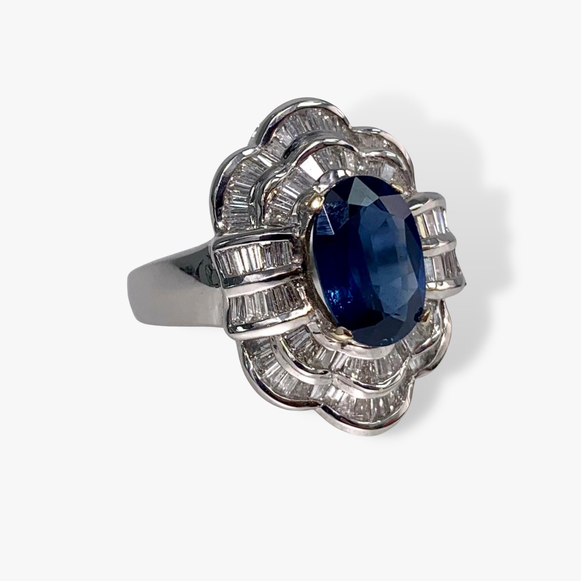 18k White Gold Oval Blue Sapphire and Baguette Diamond Vintage Ballerina Ring Side View