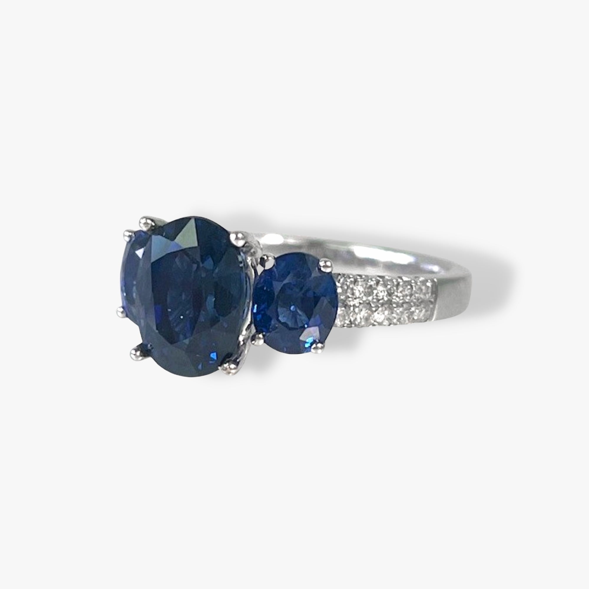 18k White Gold Blue Sapphire Diamond Pavé Three-Stone Ring Side View