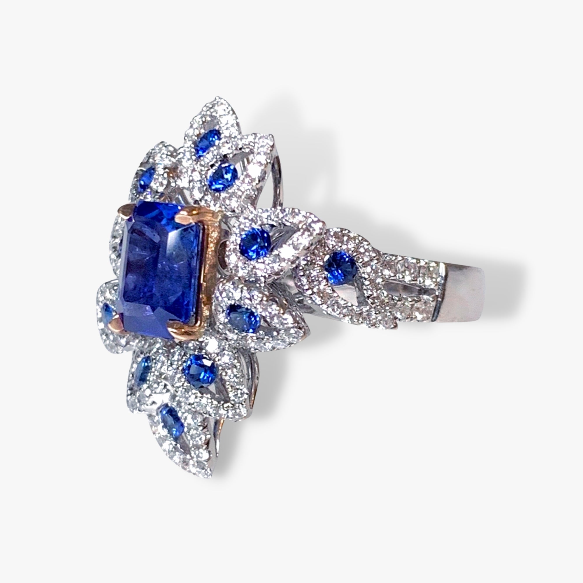 18k White Gold Emerald Cut Blue Sapphire and Diamond Floral Ring Side View