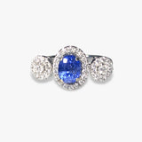 18k White Gold Oval Blue Sapphire and Diamond Three-Stone Halo Ring