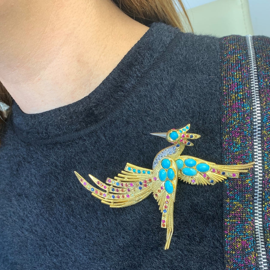 18k Yellow Gold Turquoise, Sapphire and Diamond Bird Brooch on a Model