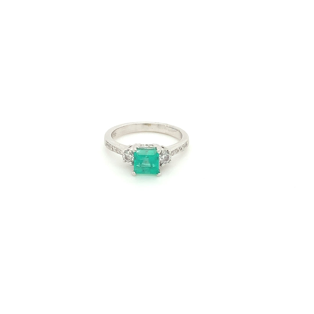 18k White Gold Emerald and Diamond Three-Stone Ring